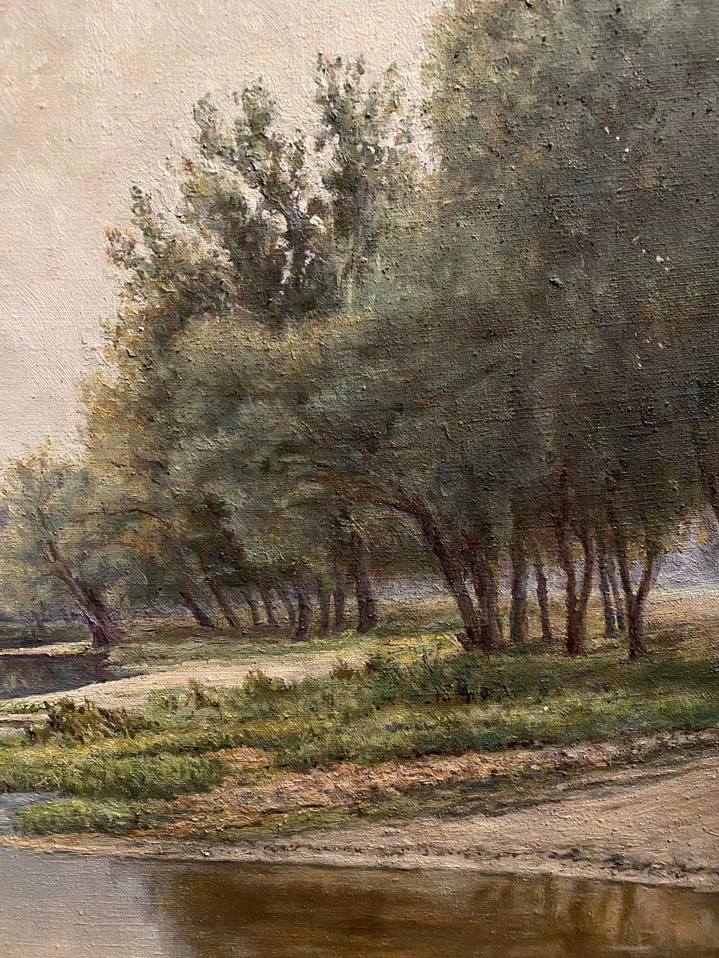 Serene oil painting by Litvinov Arkady Petrovich of sunlit olive trees by riverbank