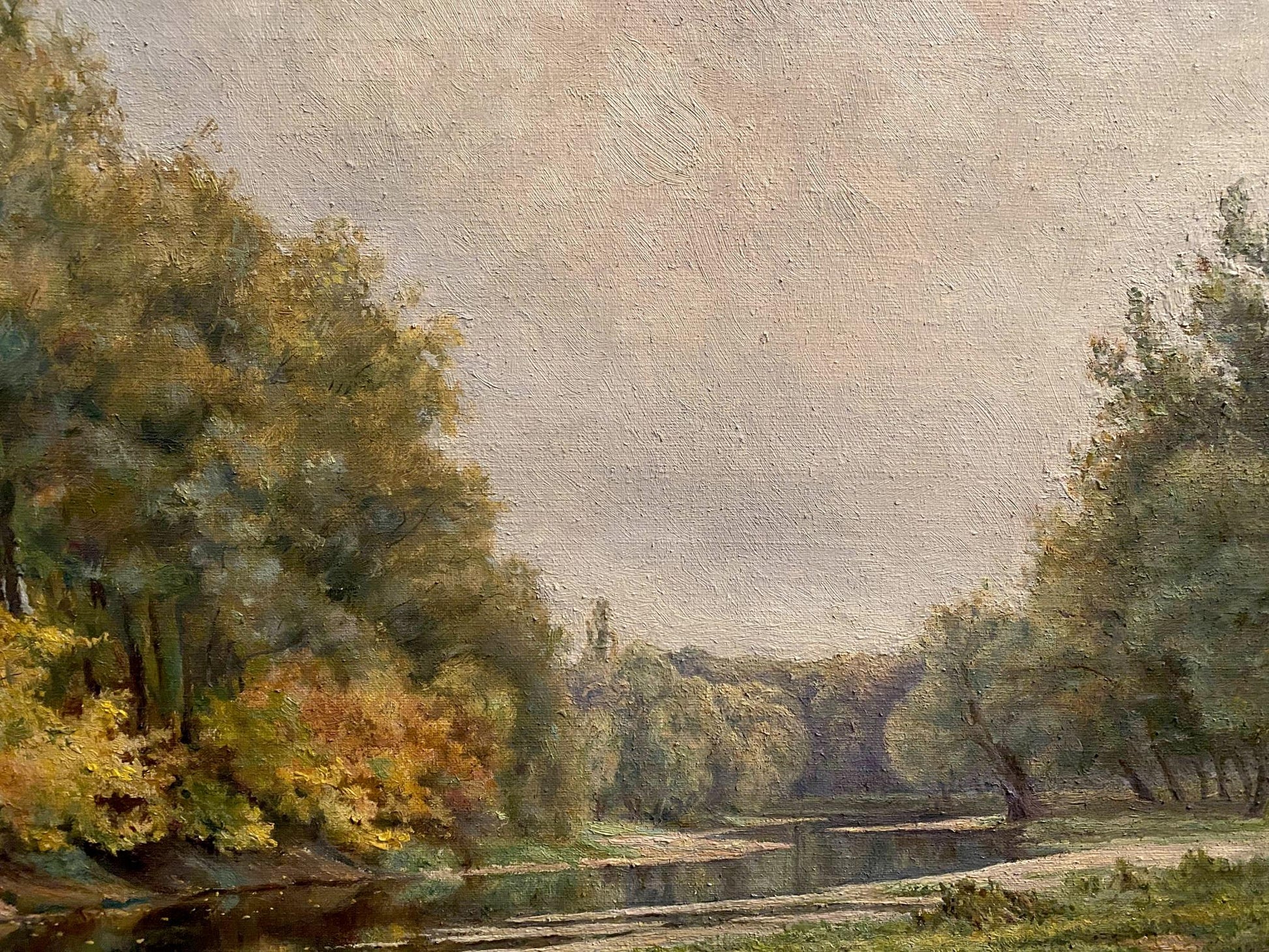 Serene oil painting by Litvinov Arkady Petrovich of sunlit autumn river