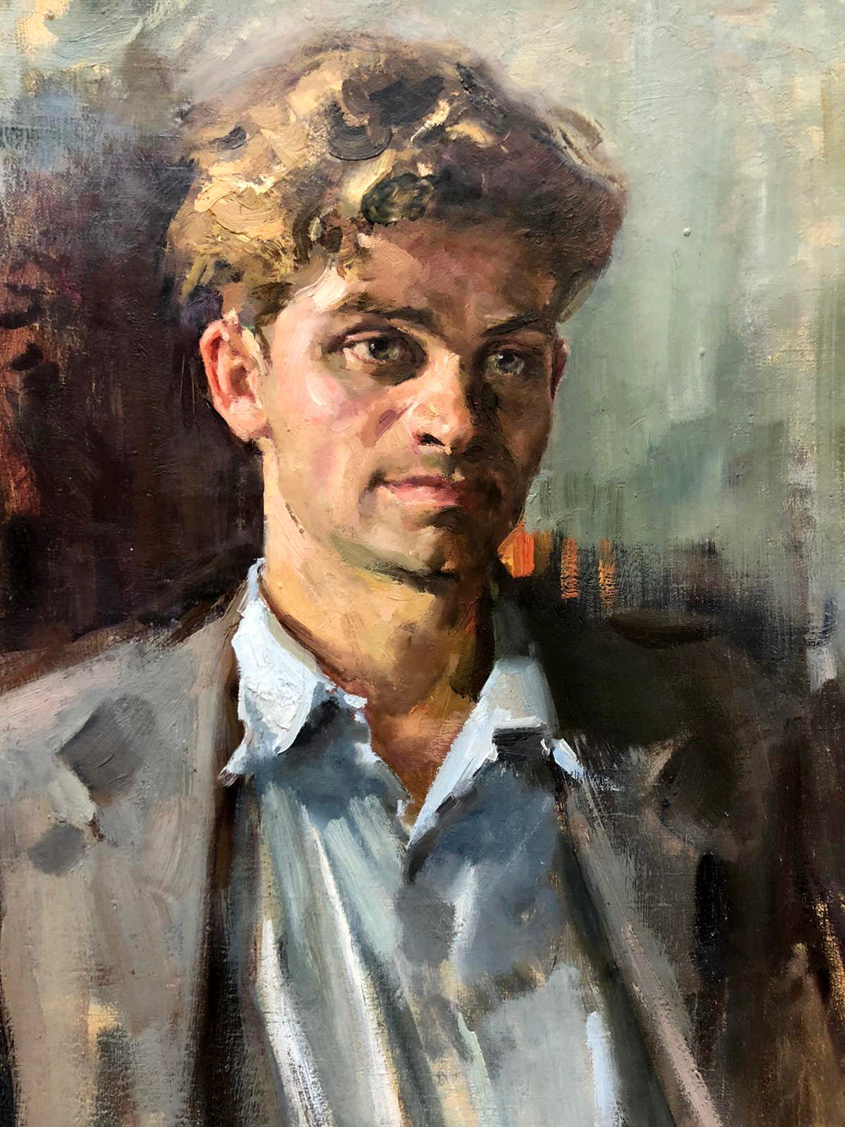 Oil painting of mans portrait by Zaretskyi Viktor, curly hair in blue shirt gray jacket