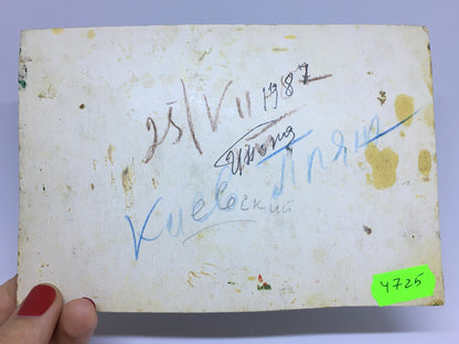 Back of oil painting by Popov I. A. with worn paper yellow stains