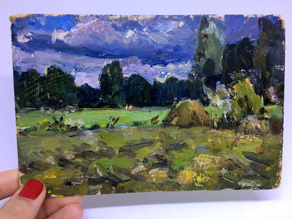 Oil painting Before the Rain by Popov I.A.: lush green field under dramatic sky
