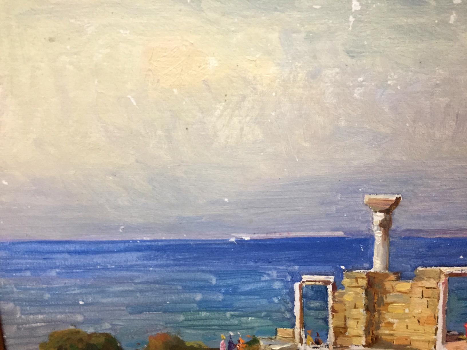 Oil painting of weathered stone column in ancient ruins by blue sea