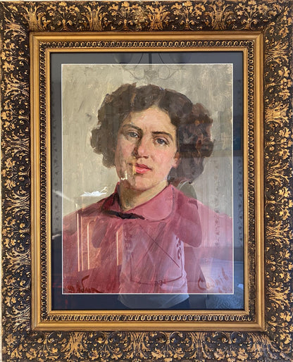 Framed portrait of woman with dark curly hair in pink shirt by Tatiana Nilovna Yablonskaya