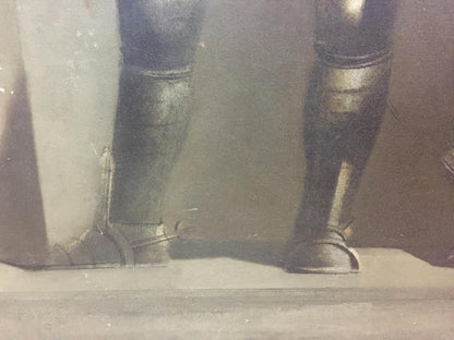 Dark metallic medieval greaves and sabatons in Vlasov oil painting portrait