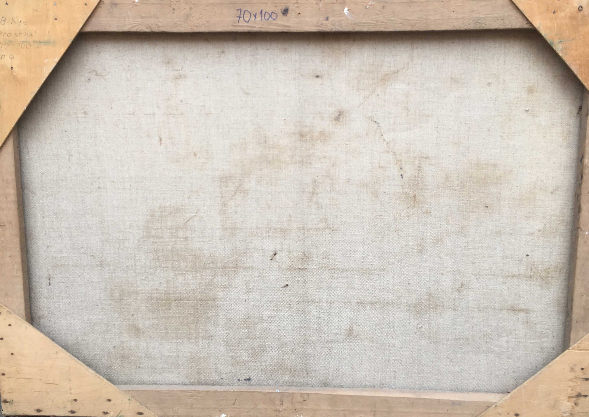 Back of framed oil painting Female Figure by Kuts Valentin Pavlovich, beige linen and wood bars