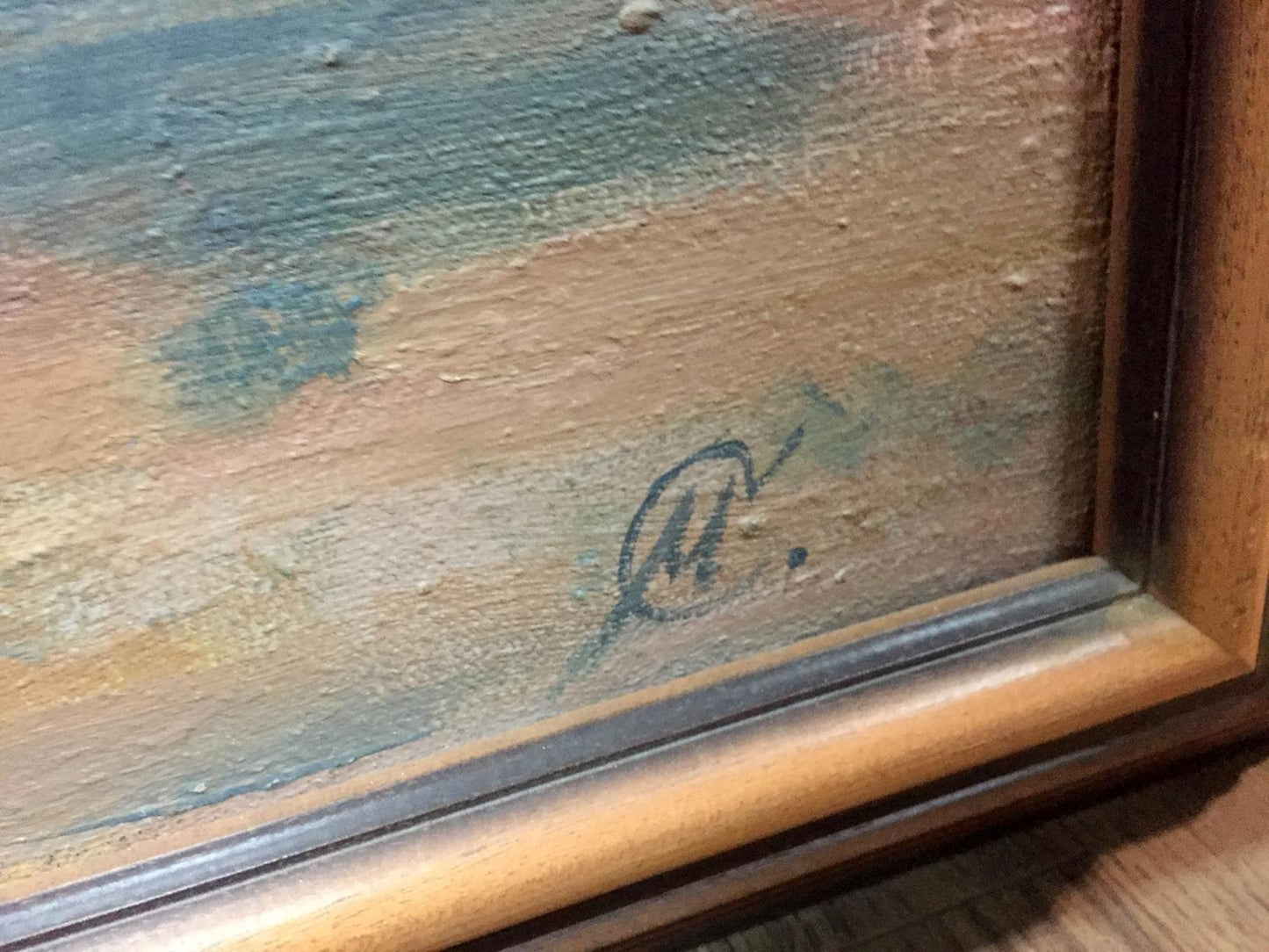 Faded blue artist’s signature on back of oil painting Ships textured canvas