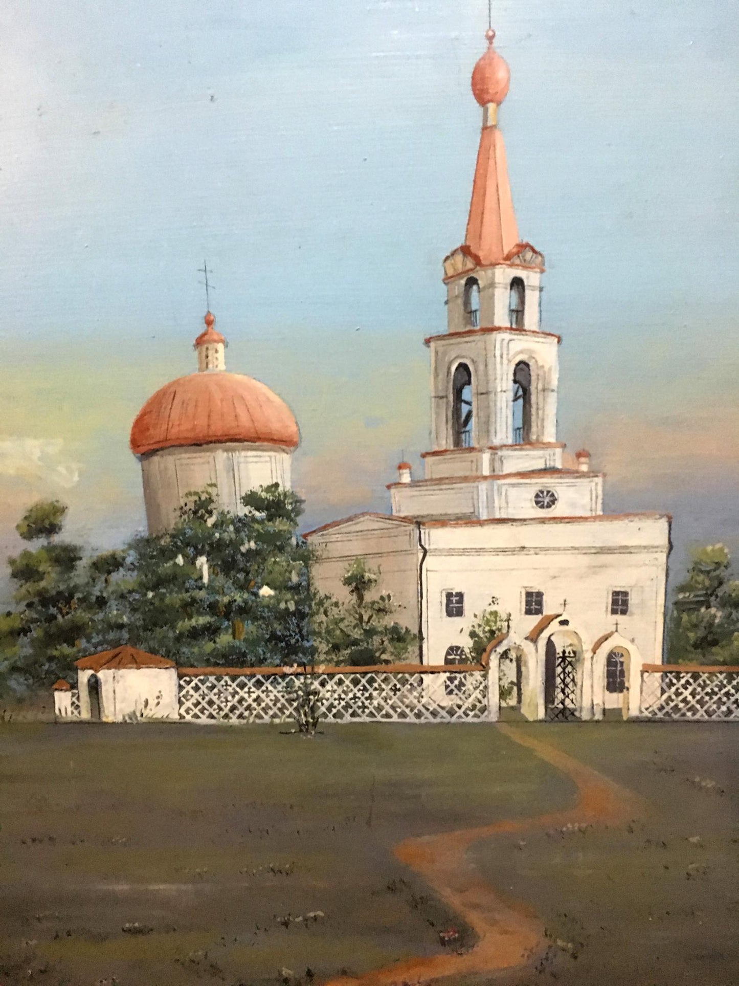 Oil painting of white Old Lubotin church with orange domes and spires
