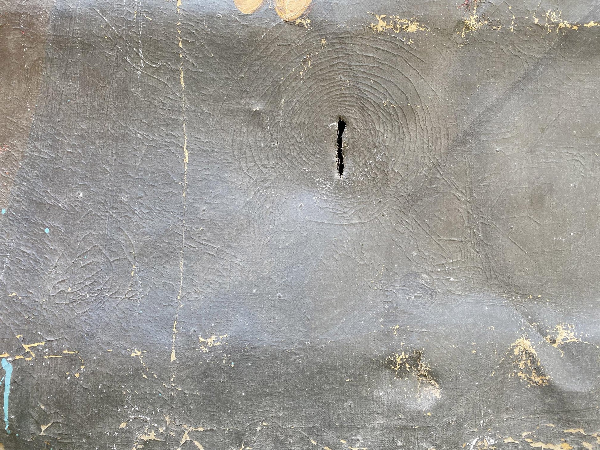 Worn gray leather back of Brezhnev portrait oil painting with keyhole cracks