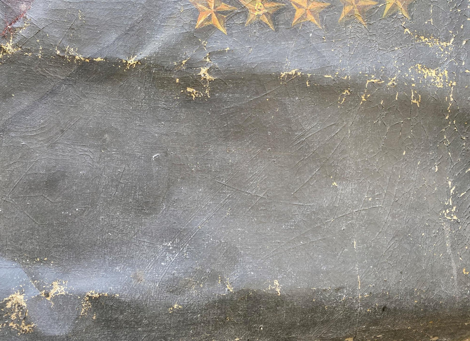 Back of Brezhnev social realism portrait with worn gray leather and faded gold stars