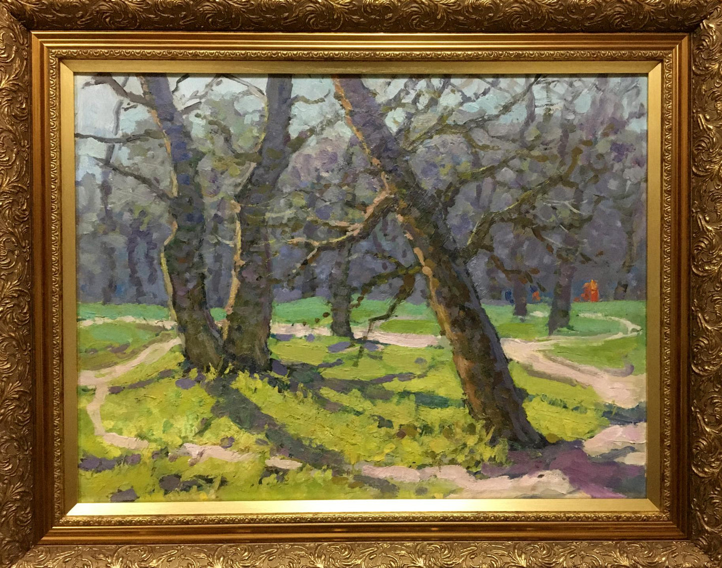 Ornate gold-framed oil painting of running path in forest by unknown artist