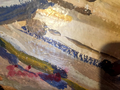 Weathered wooden palette with textured blues, yellows, reds, whites for Oil painting Its a nasty day