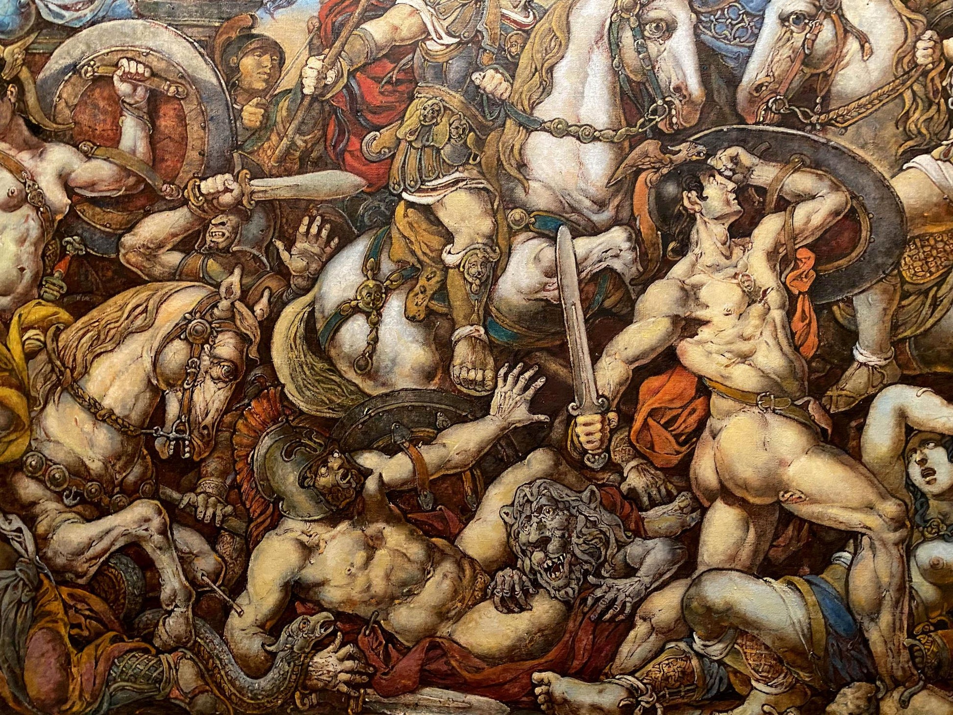 Oil painting Battle with the Amazons by Litvinov Oleg Arkad’yevich: muscular warrior in red and gold armor wielding sword and holding helmet