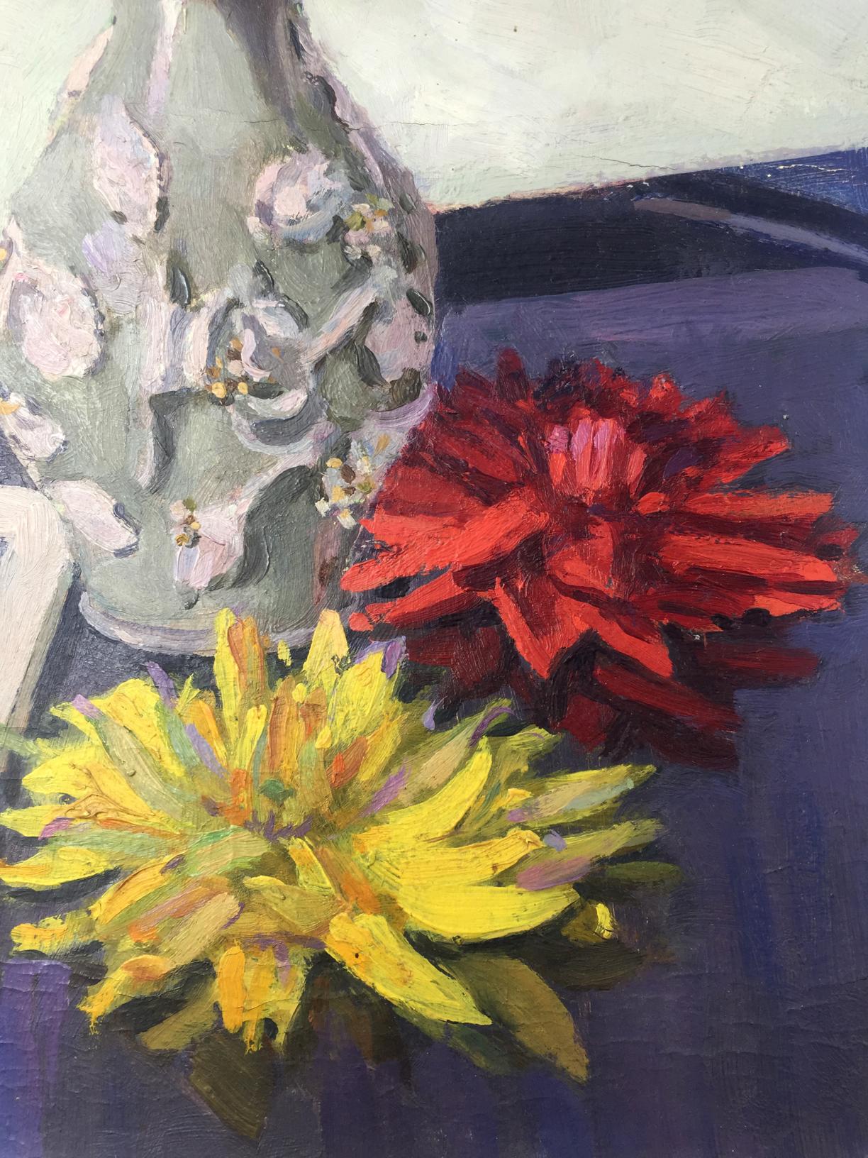 Oil painting of light green glazed ceramic vase with white floral relief beside red yellow chrysanthemums