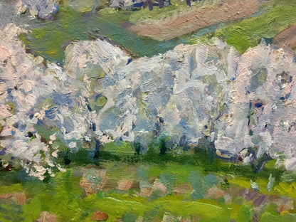 Oil painting Spring landscape by Georgy Kolosovsky: white blossoming trees on green field