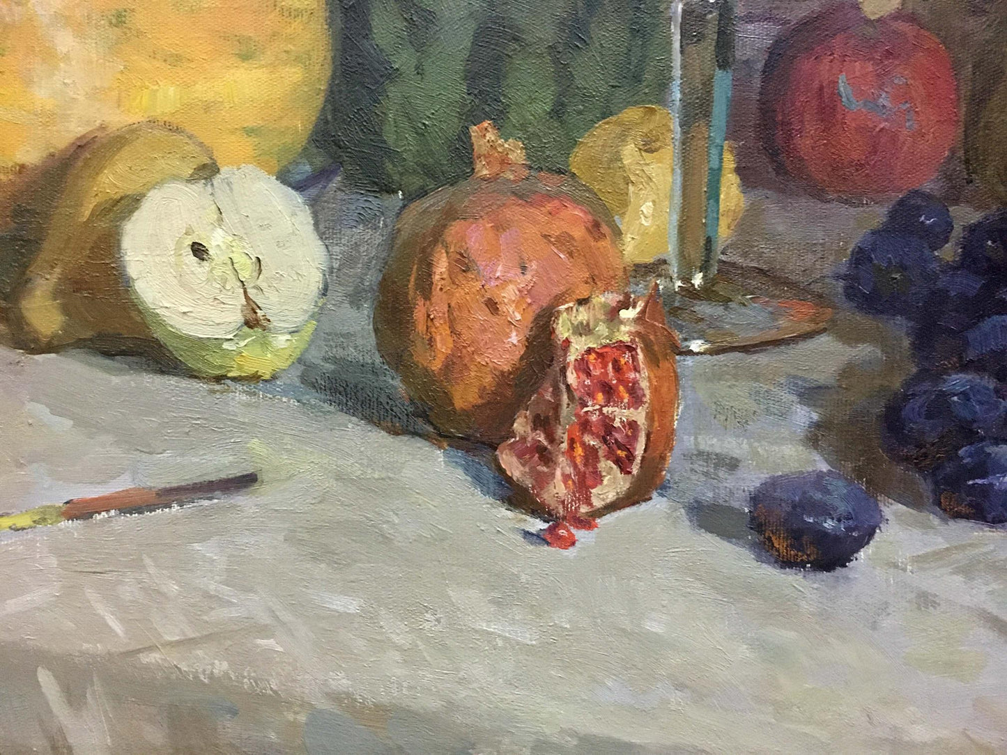 Oil painting Gifts of Autumn by Wolstein Moses Lvovich: opened pomegranate with red seeds spilling out