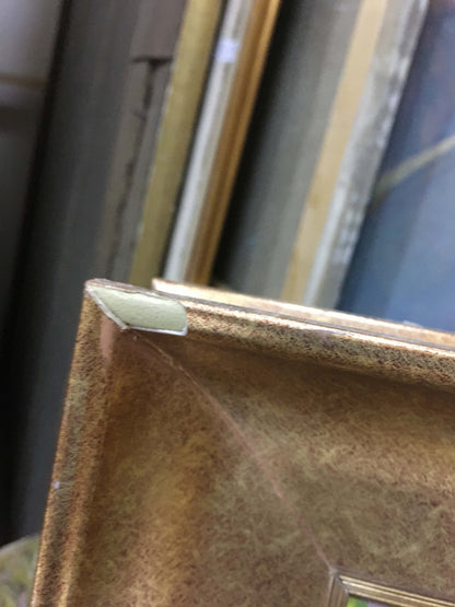 Gold-toned textured frame with white corner protector for Lilac Chegodar oil painting