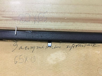 Back of Vasily Chegodar oil painting with black rubber seal and white component