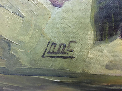 Black ink signature on textured greenish canvas back of oil painting Flowers