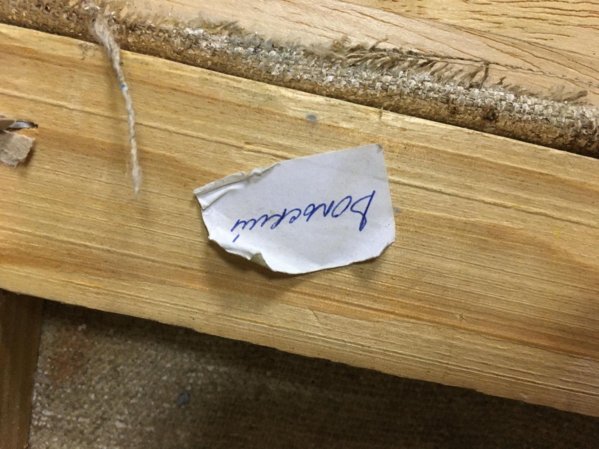 Torn white paper label with Bontecou in blue ink on Volsky Petr Dmitrievich oil painting back