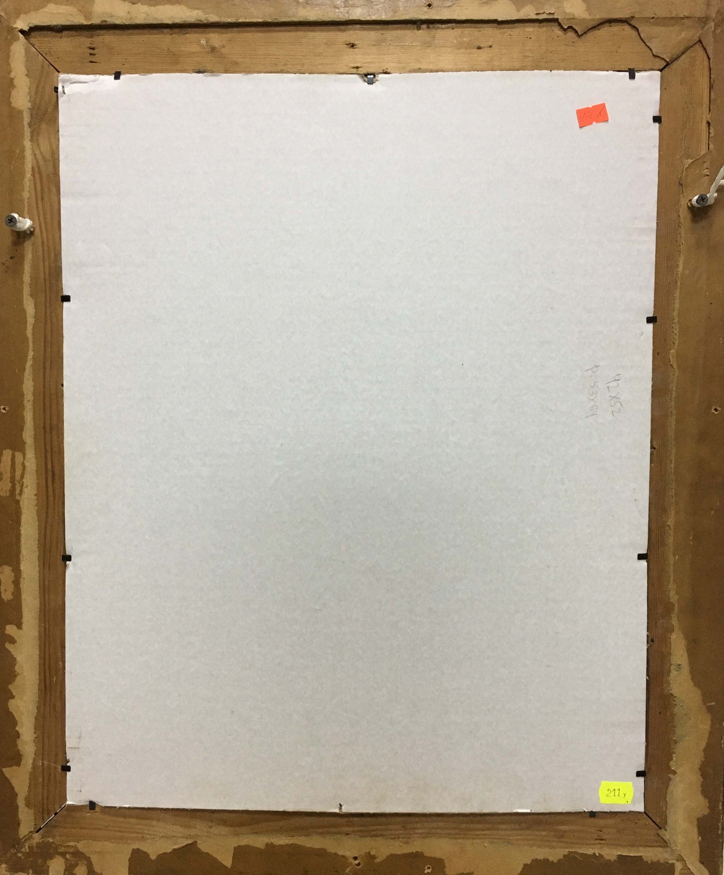 Back of white canvas in weathered wooden frame for Oil painting Portrait of muslim