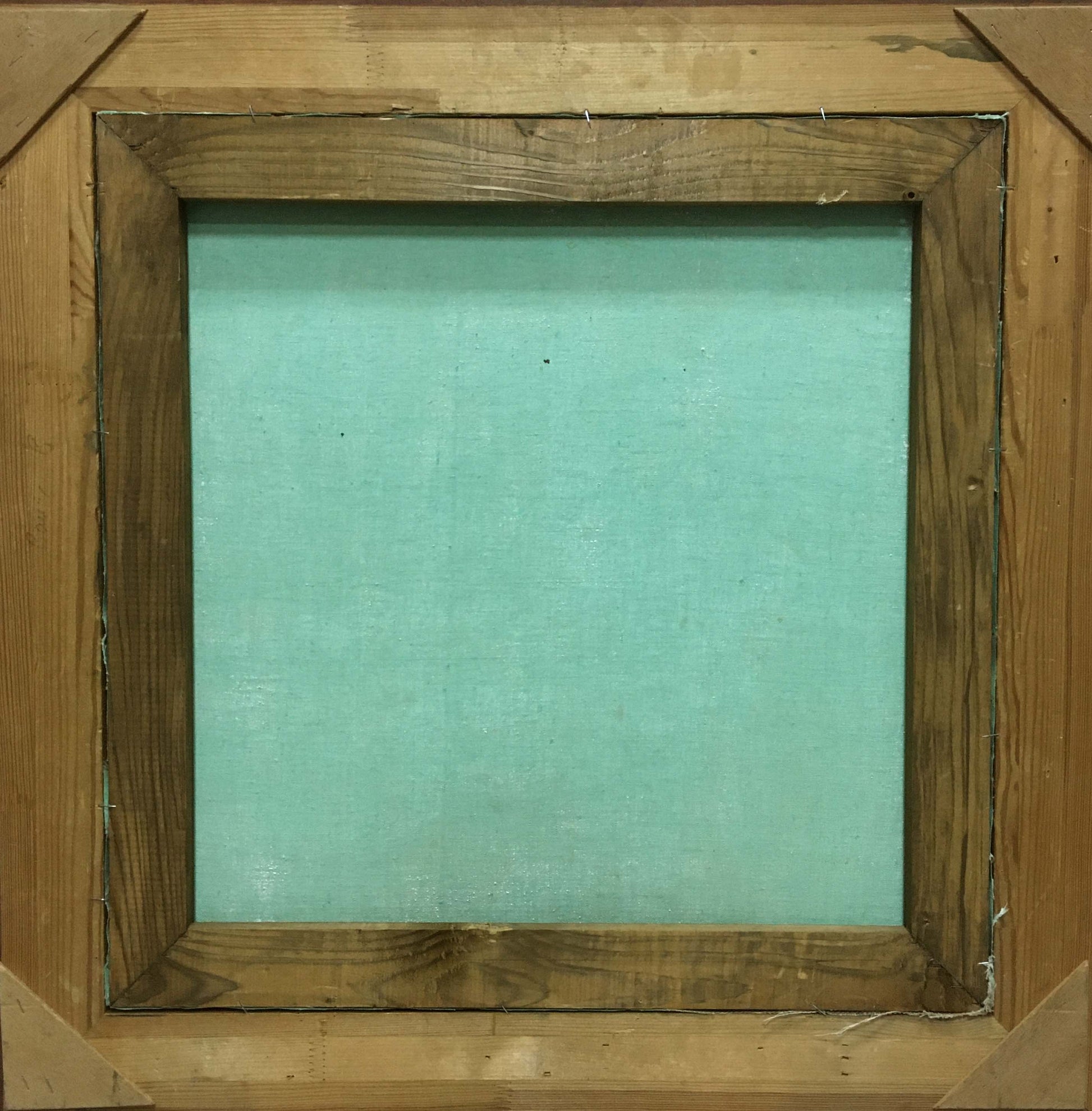 Oil painting Flowers by unknown artist on light teal canvas in rustic wood frame