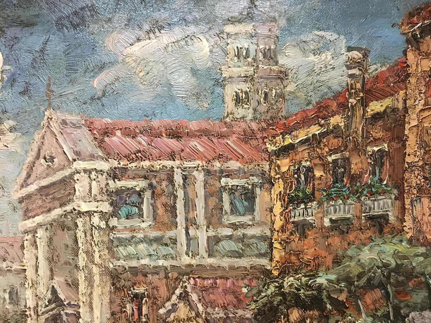 Oil painting of summer city landscape with terracotta roofs and stone tower
