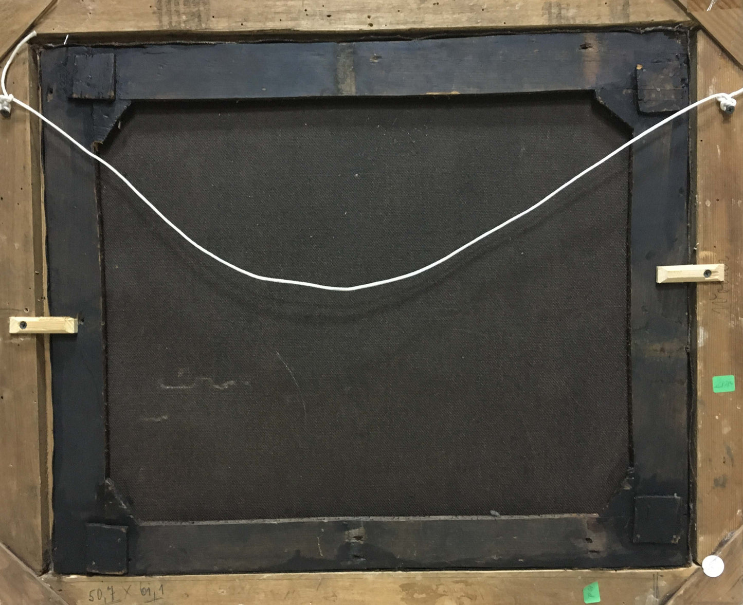 Back of oil painting Summer city landscape with black canvas, wooden frame, white wire