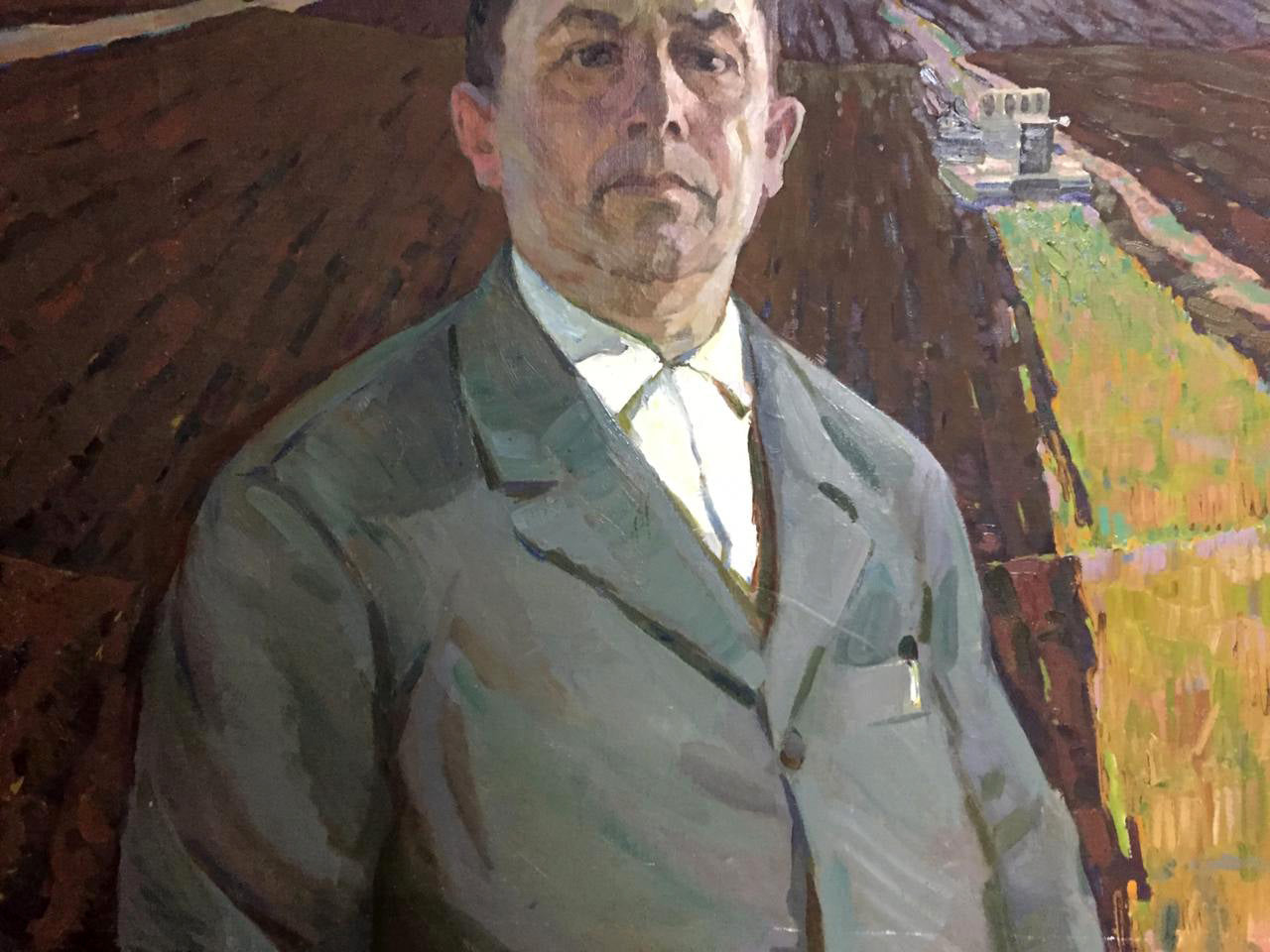 Social realism oil portrait of Chvala Dmitry Andreevich in gray suit