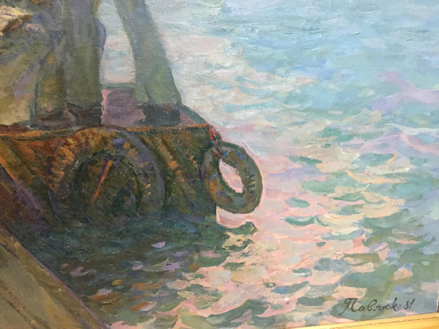 Weathered dark green life preserver on rustic boat in Pavlyuk painting