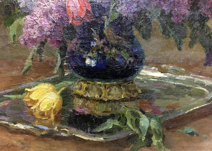 Oil painting of lilacs and tulips in deep blue vase with gold base