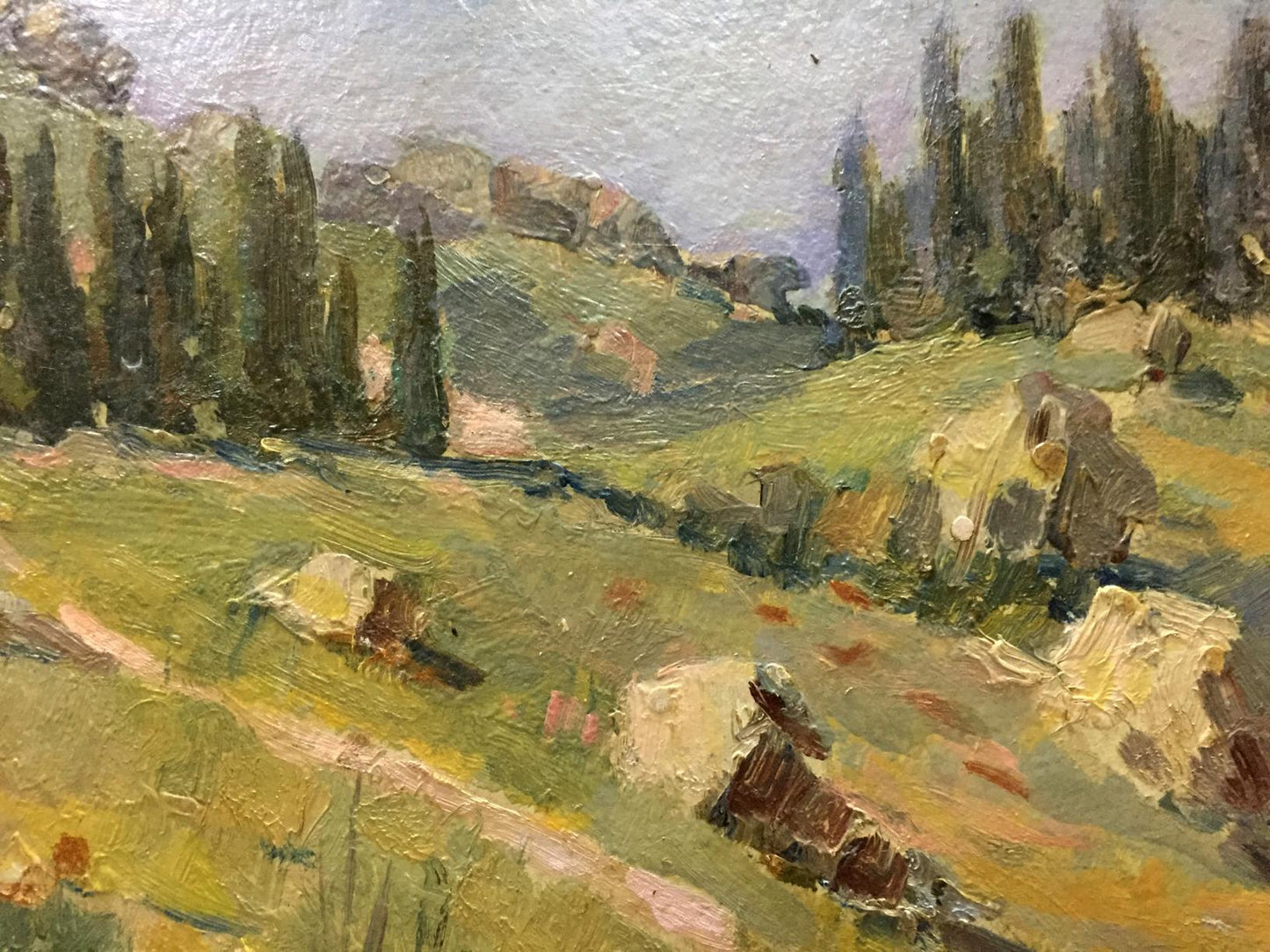 Oil painting of sunlit mountain countryside with hills, cypresses