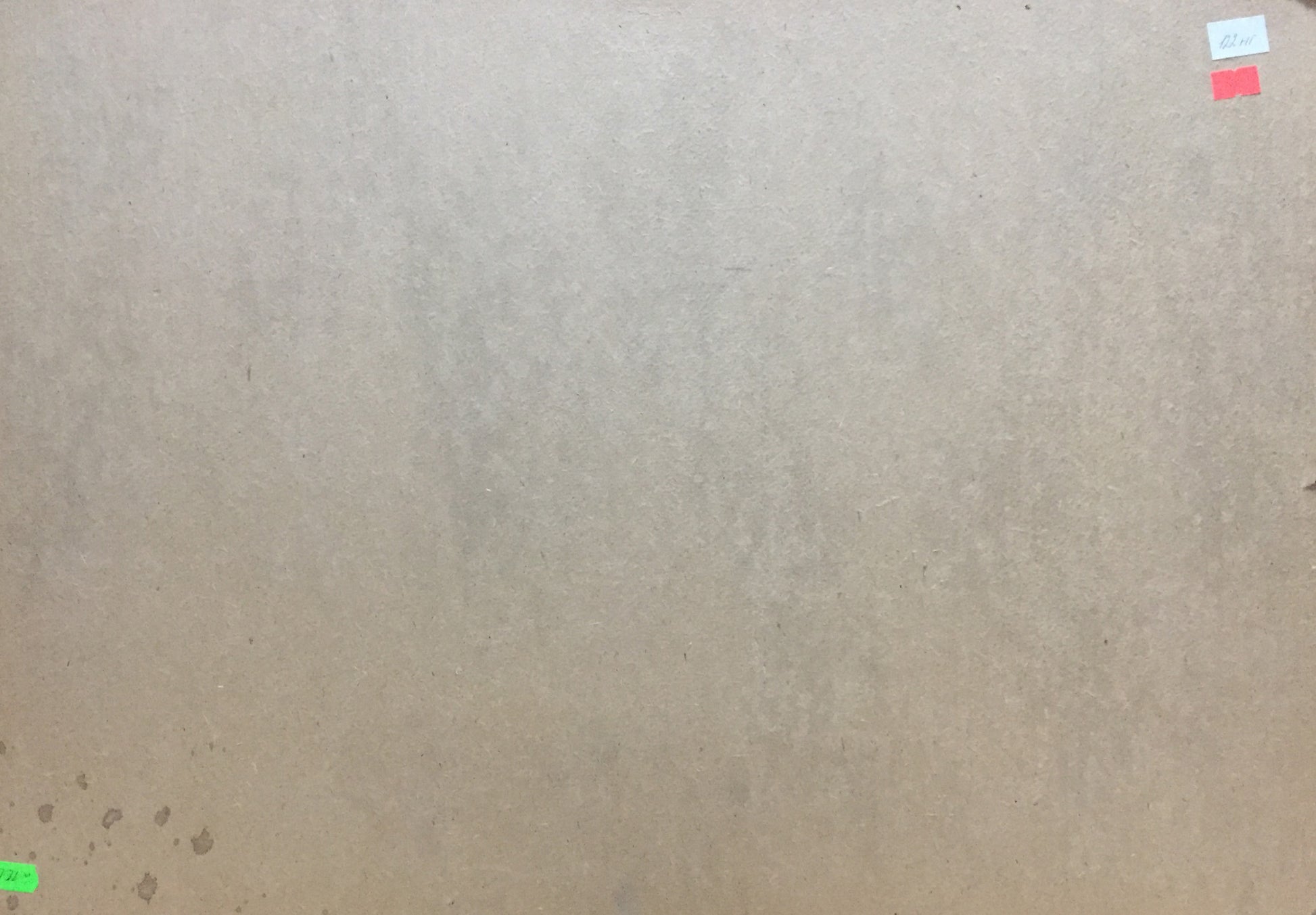 Back of oil painting Boat port on brown cardboard with stains and red sticker