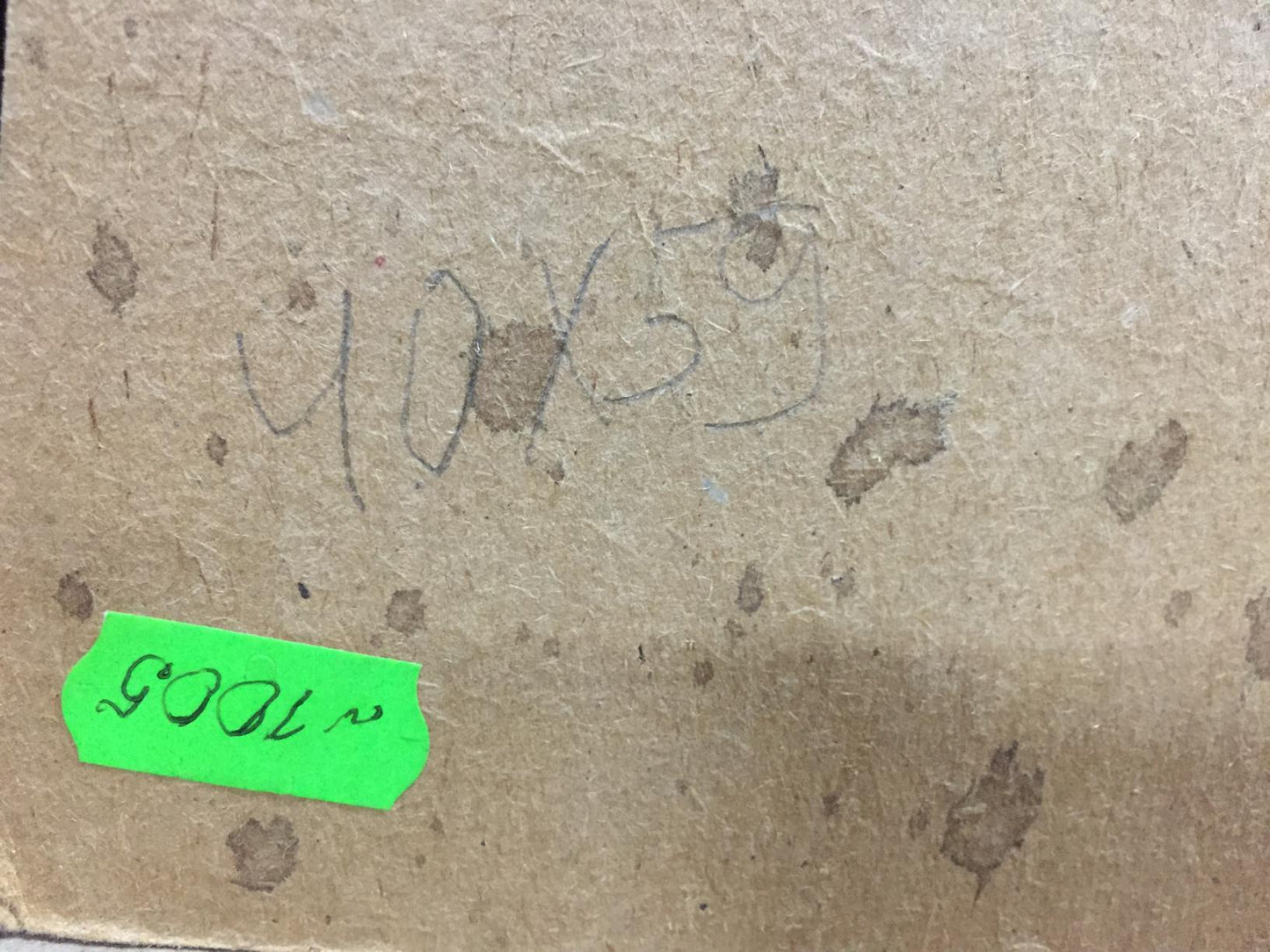 Back of oil painting Boat port on brown cardboard with markings and green sticker