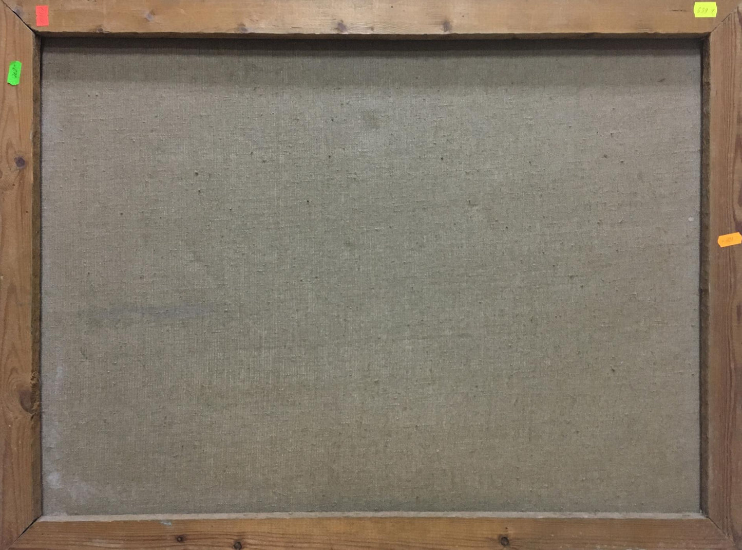 Back of oil painting Portrait of a man Mikita Vladimir Vasilievich on wooden-framed canvas with gray fabric backing
