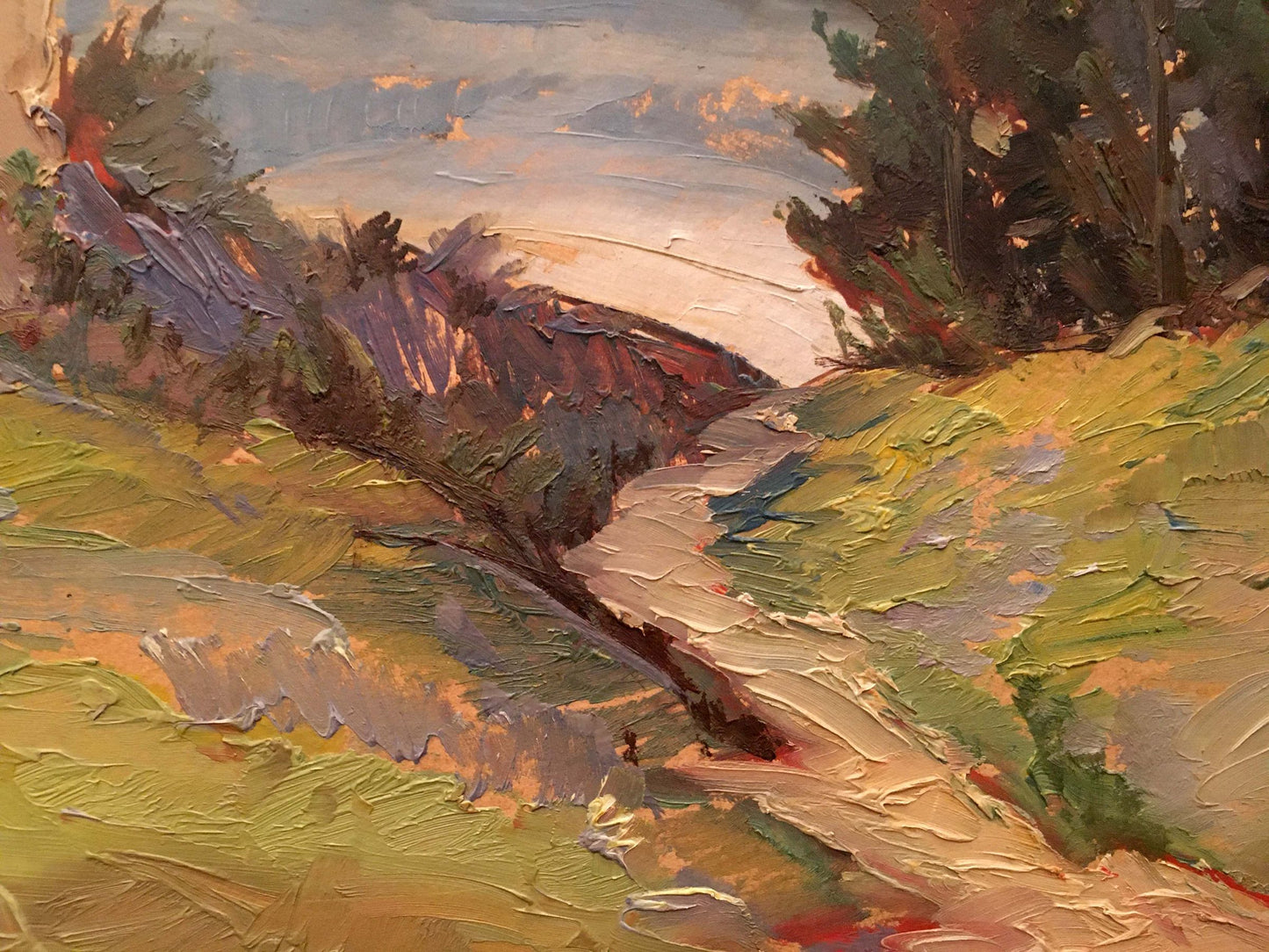 Impressionistic oil painting of church by river in earthy greens and pinks