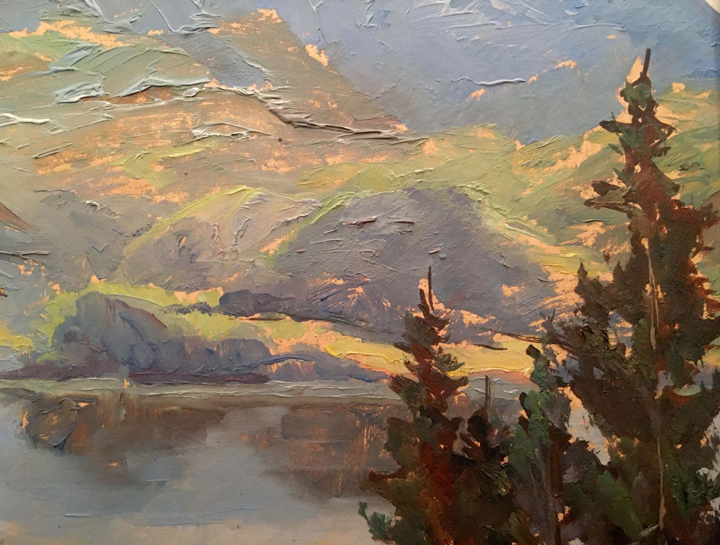 Impressionistic oil painting of church by river with mountains, lake, trees