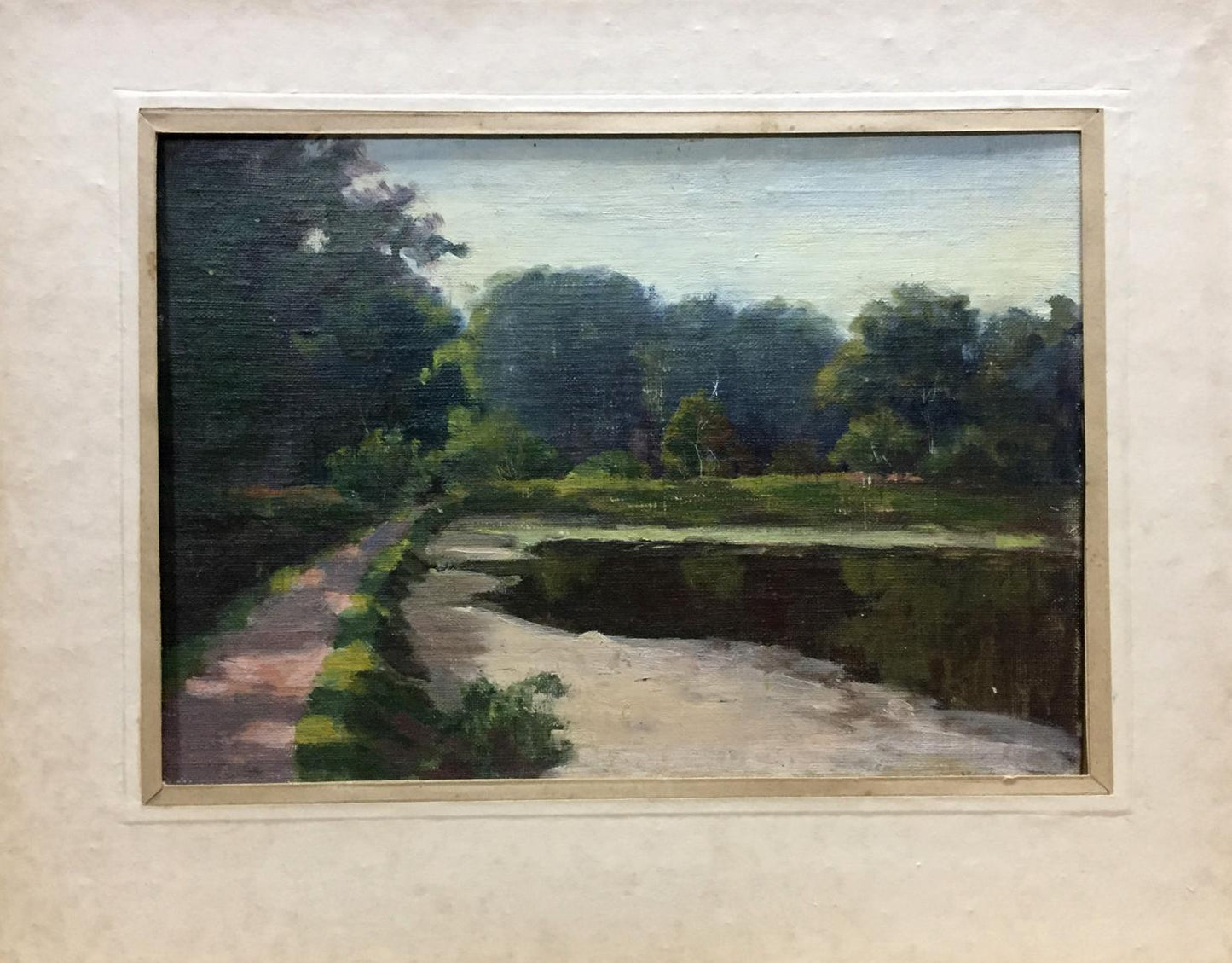 Framed oil painting of road along river, forest, dark green trees by unknown artist