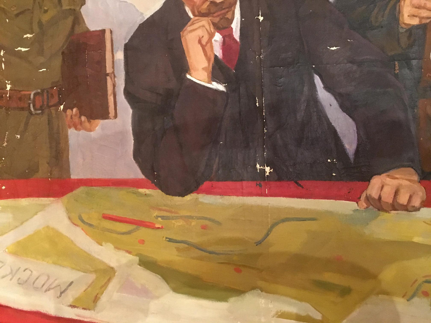 Oil painting of Lenin in navy suit with red tie and white cuffs by Serov