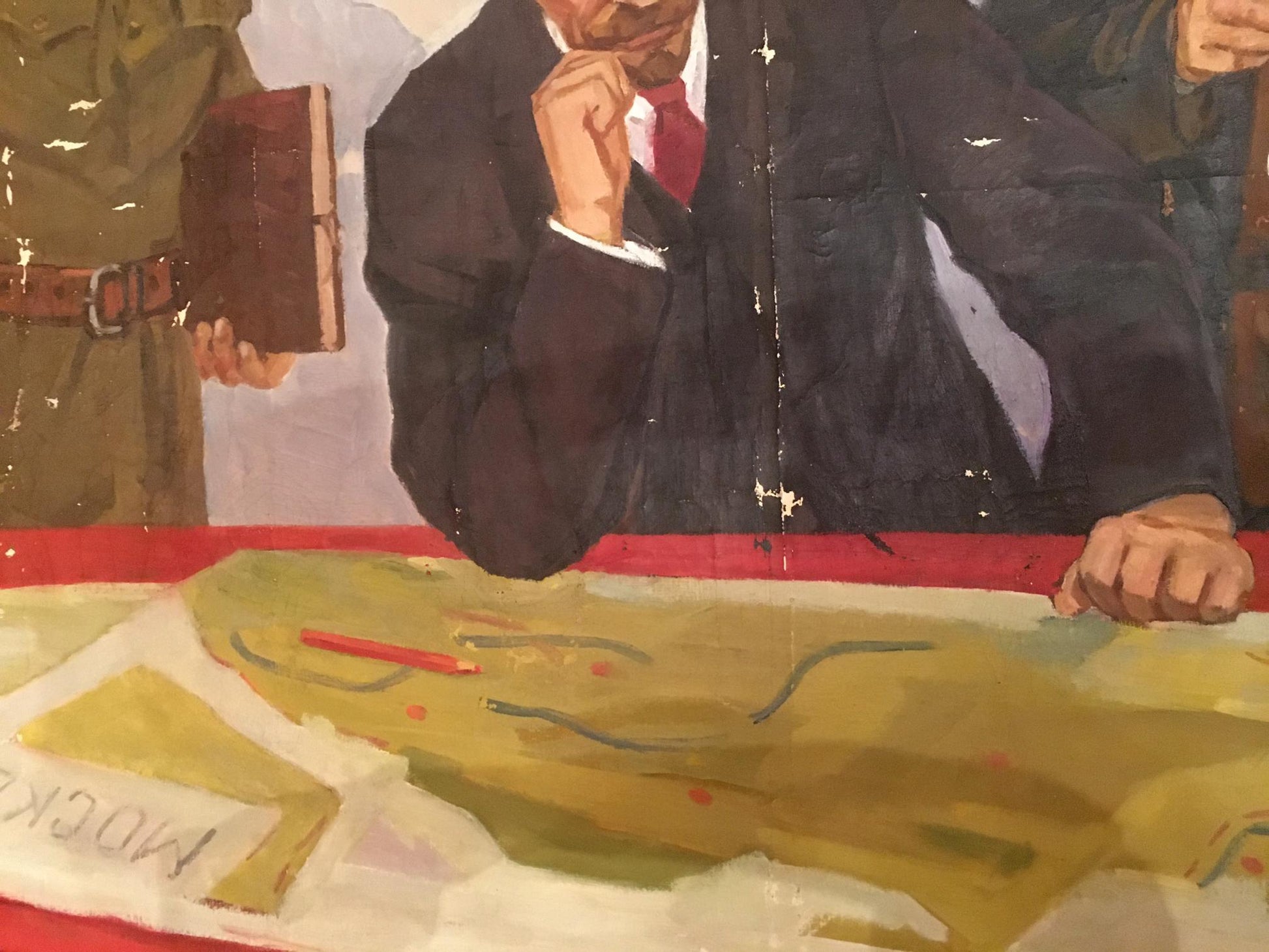 Oil painting of Lenin in navy suit with red tie and white cuffs by Serov