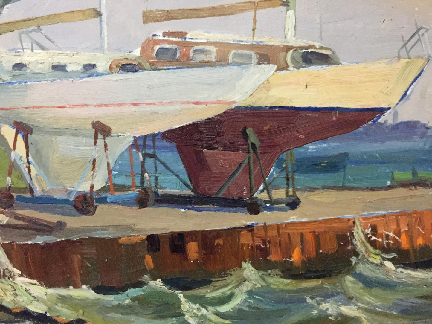 Oil painting of white and red sailboat on supports at Ships Bay dock