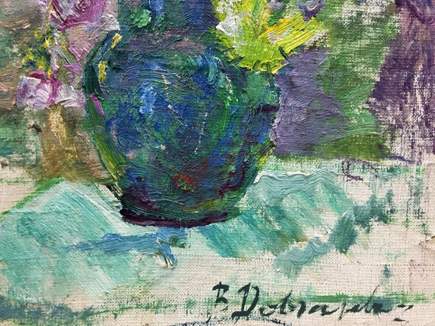 Textured deep blue-green ceramic vase by Dovgalevskaya Vera Veniaminovna with vibrant pink and yellow spring flowers