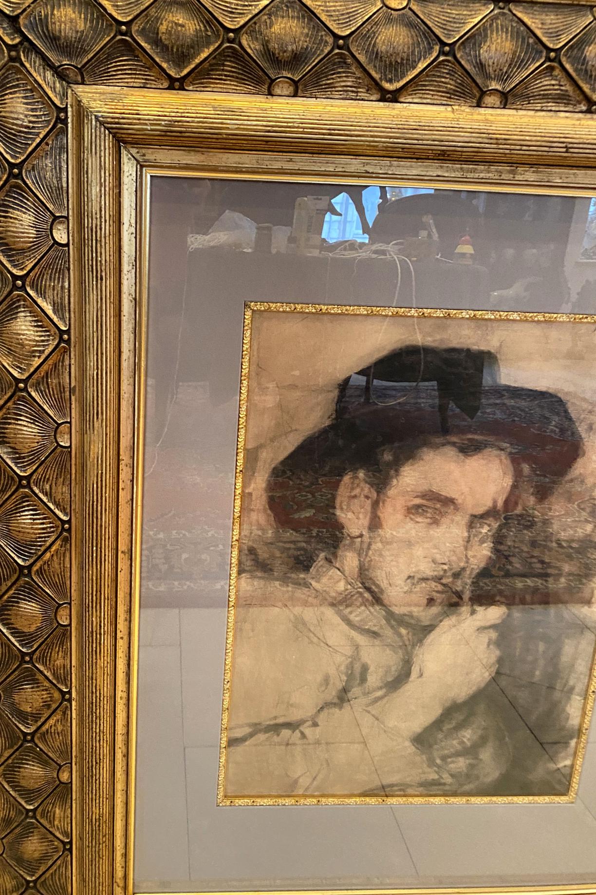 Vintage portrait painting of man by Ilya Efimovich Repin in ornate gold frame