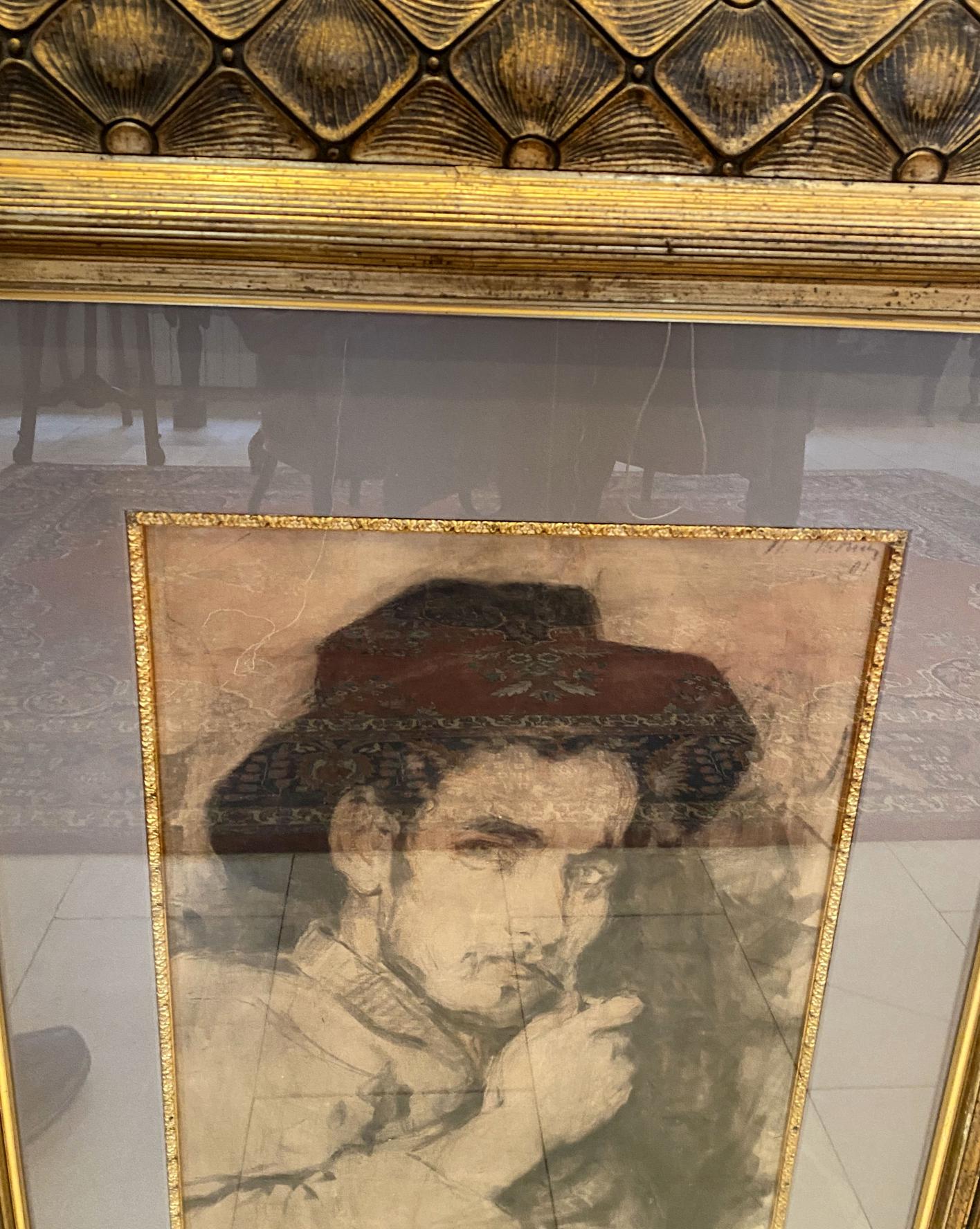 Vintage Ilya Repin portrait of man in red black hat, gold frame, sepia tones