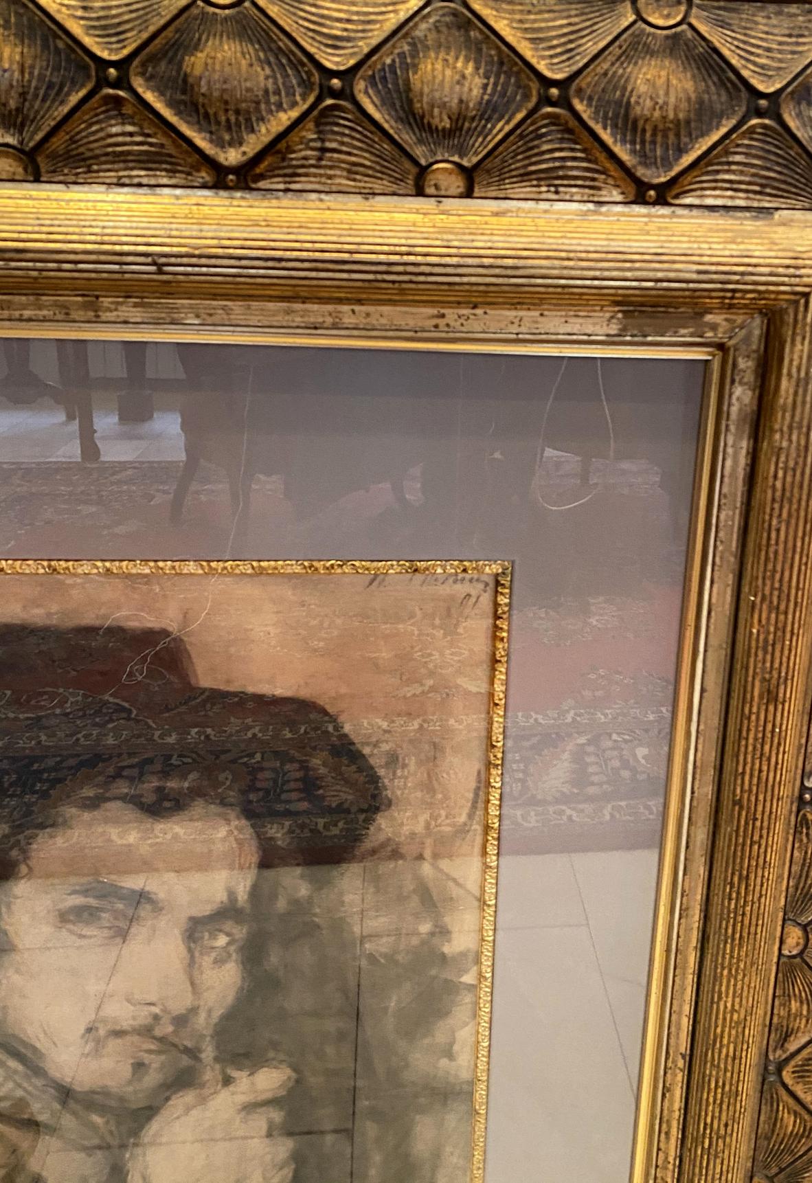 Vintage gold-framed portrait of man by Ilya Efimovich Repin, sepia-toned