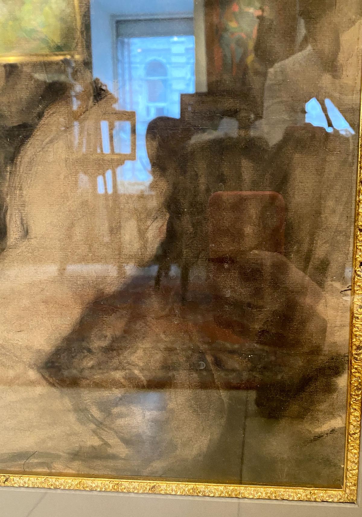 Gold-framed Ilya Repin portrait of a man in dimly lit interior