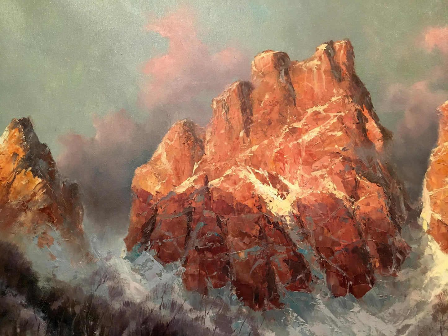 Oil painting Winter landscape by Heinrich Hartung: reddish-orange rocks under pink-gray sky