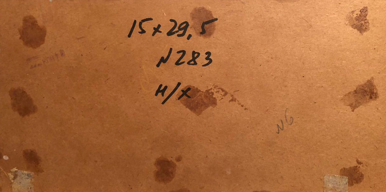 Back of brown cardboard box for oil painting There’s a boat on the shore with handwritten measurements