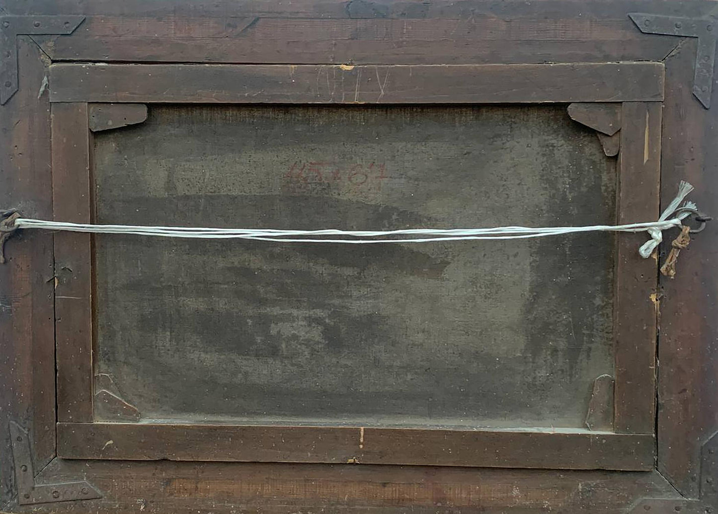 Back of dark brown wooden frame for Oil painting By the river Voronkov with metal corners and white string