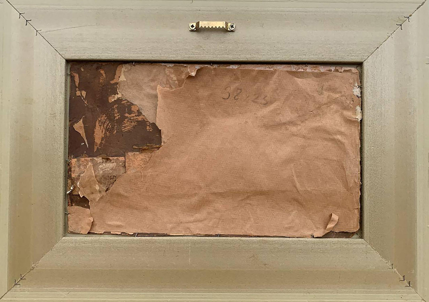 Back of beige-framed Lonely house oil painting by Vzheshch Yevhen Ksaveriyovych with peeling paper