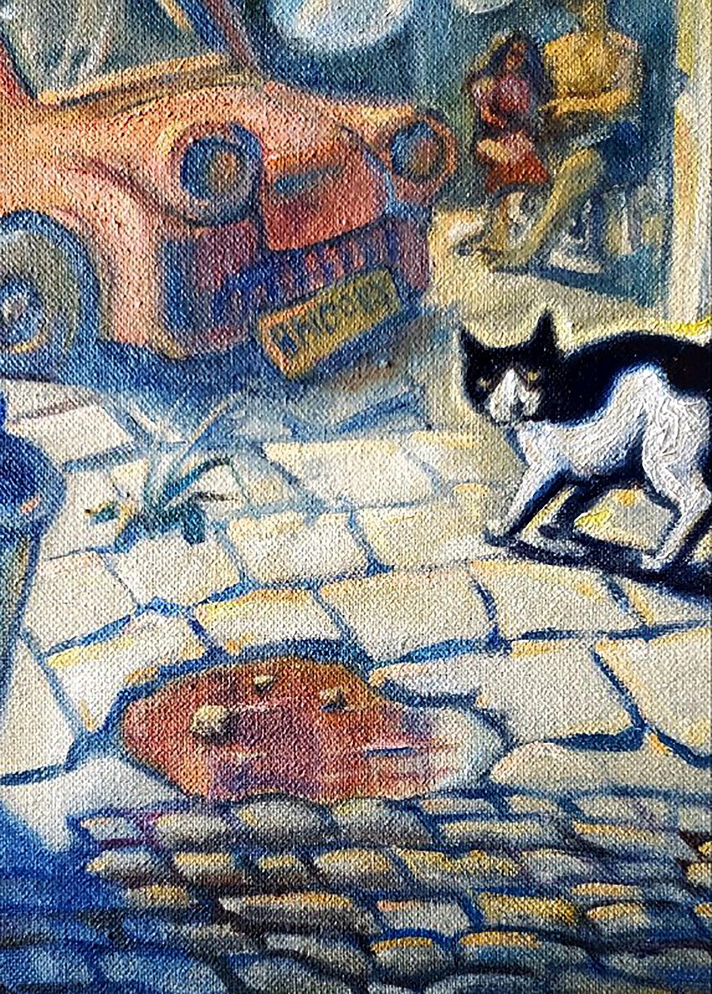 A black and white cat with a sleek coat walks across cobblestone pavement.